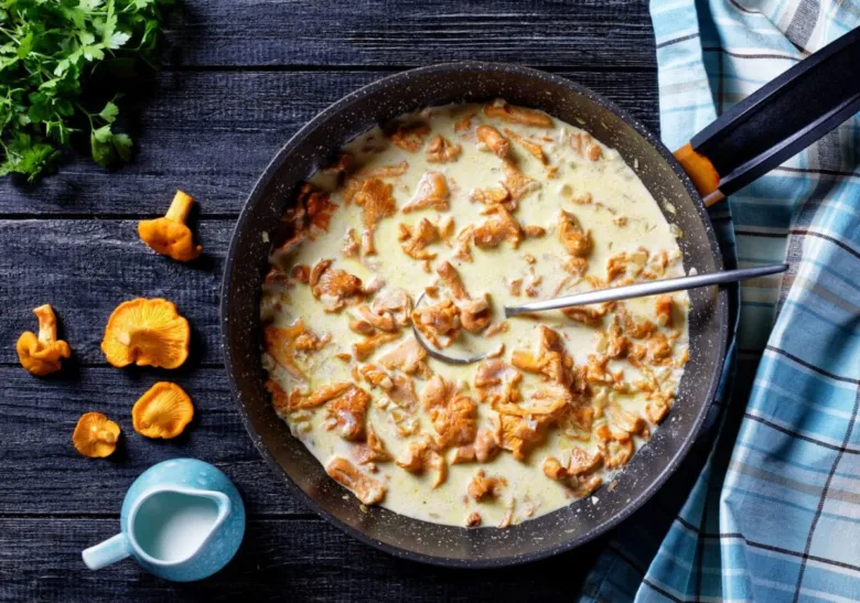 Creamed chanterelle sauce in pan