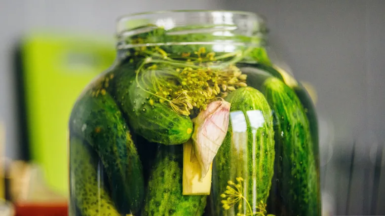 Pickled cucumbers in jar