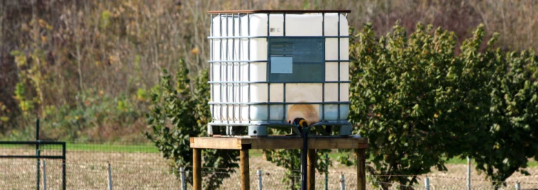 Ibc container on stand