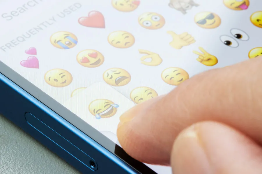 Thumb up emoji on phone screen