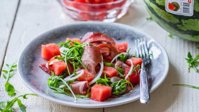 Watermelon salad with prosciutto and arugula